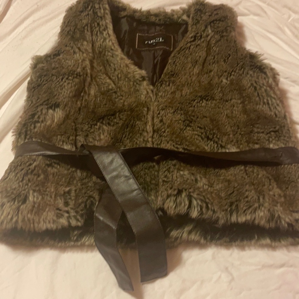 Faux fur vest with leather belt